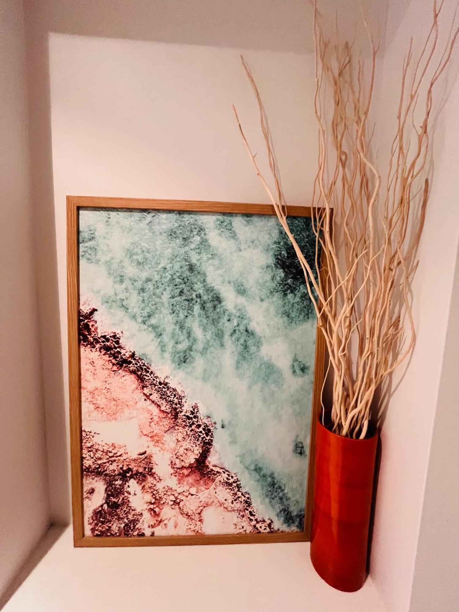 At Marina Shores Airlie Beach Exterior photo A painting by the artist