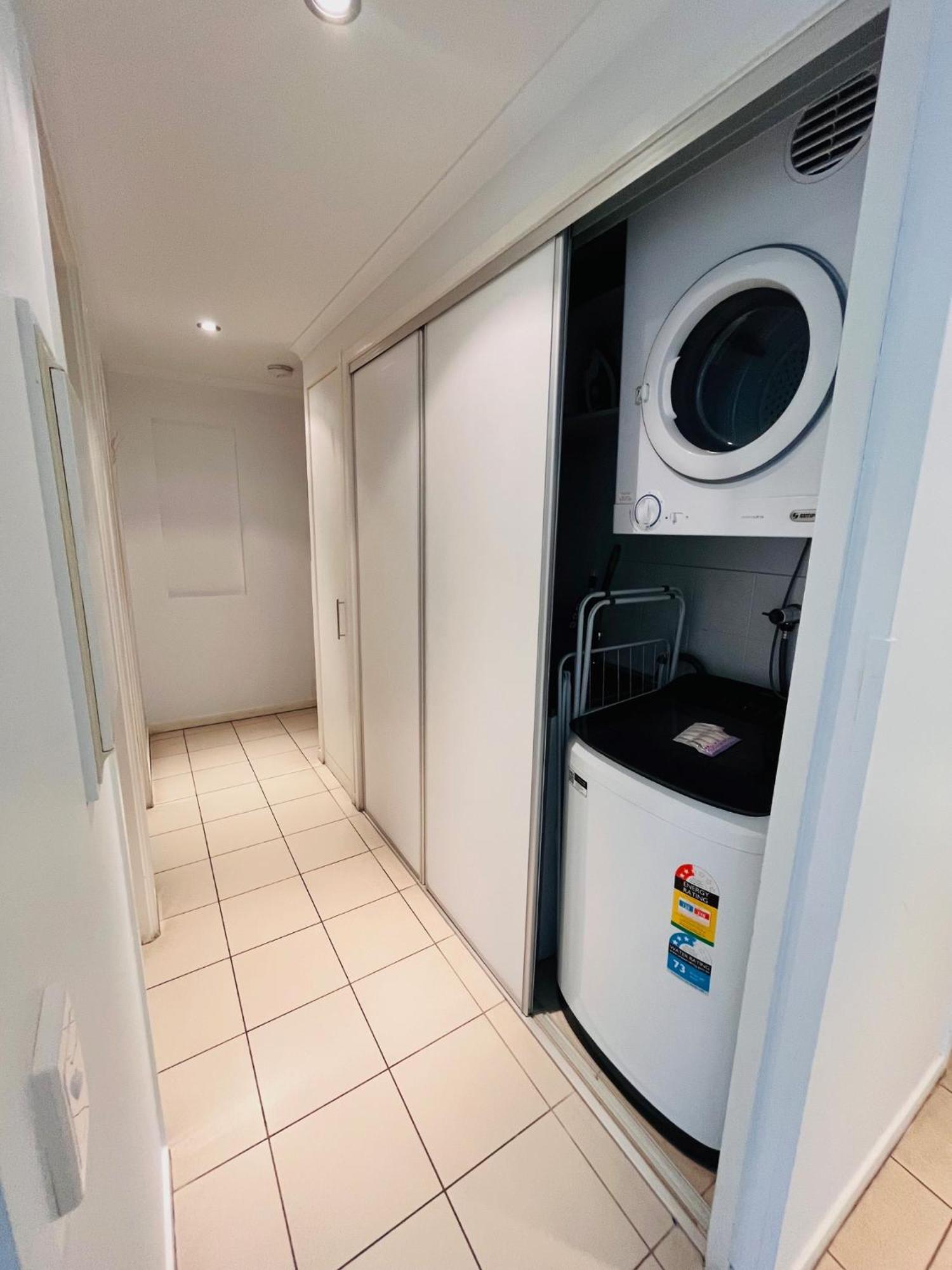 At Marina Shores Airlie Beach Exterior photo A laundry room in a residential apartment